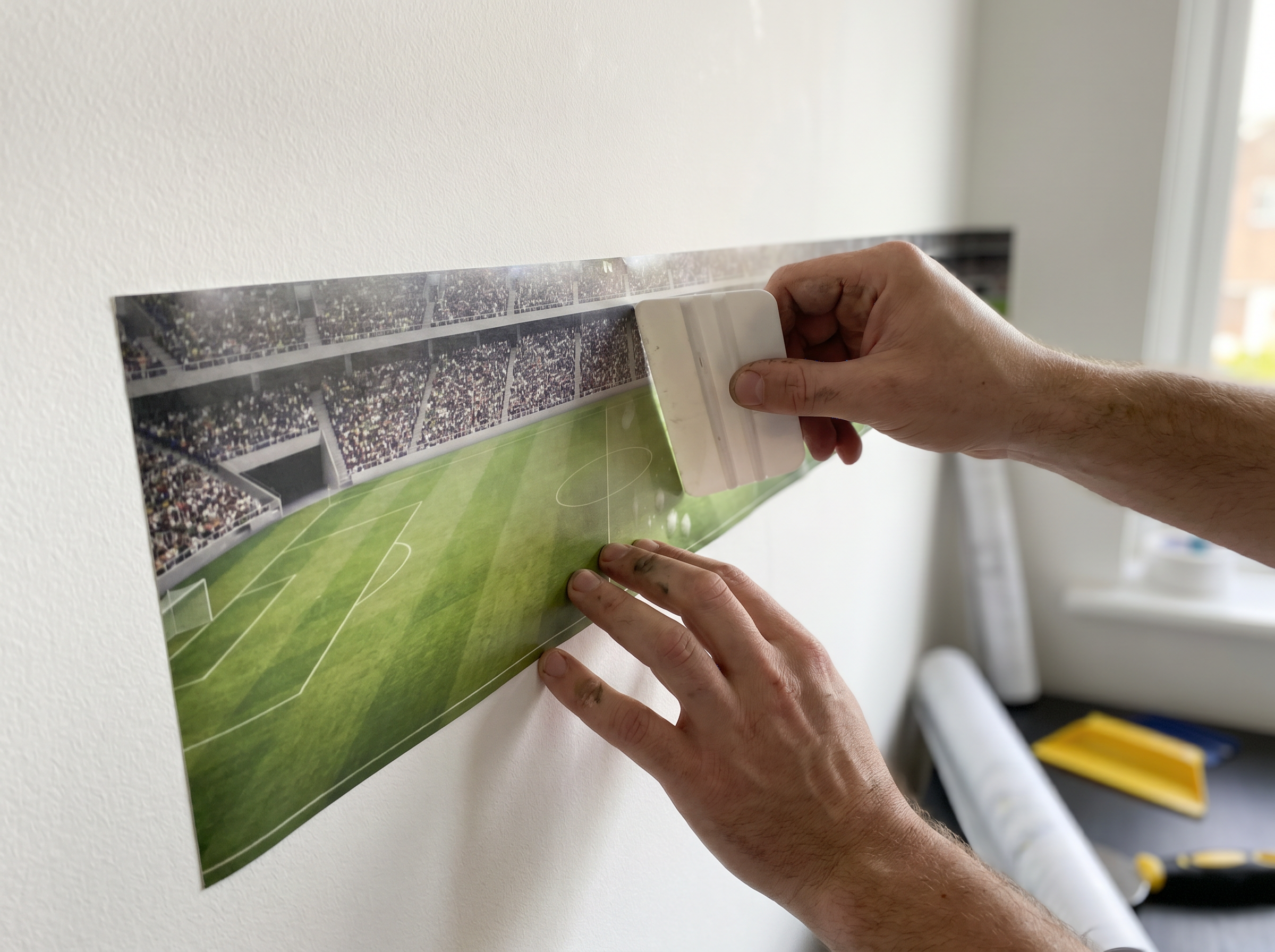 Comment poser un papier peint panoramique foot : le guide pas à pas