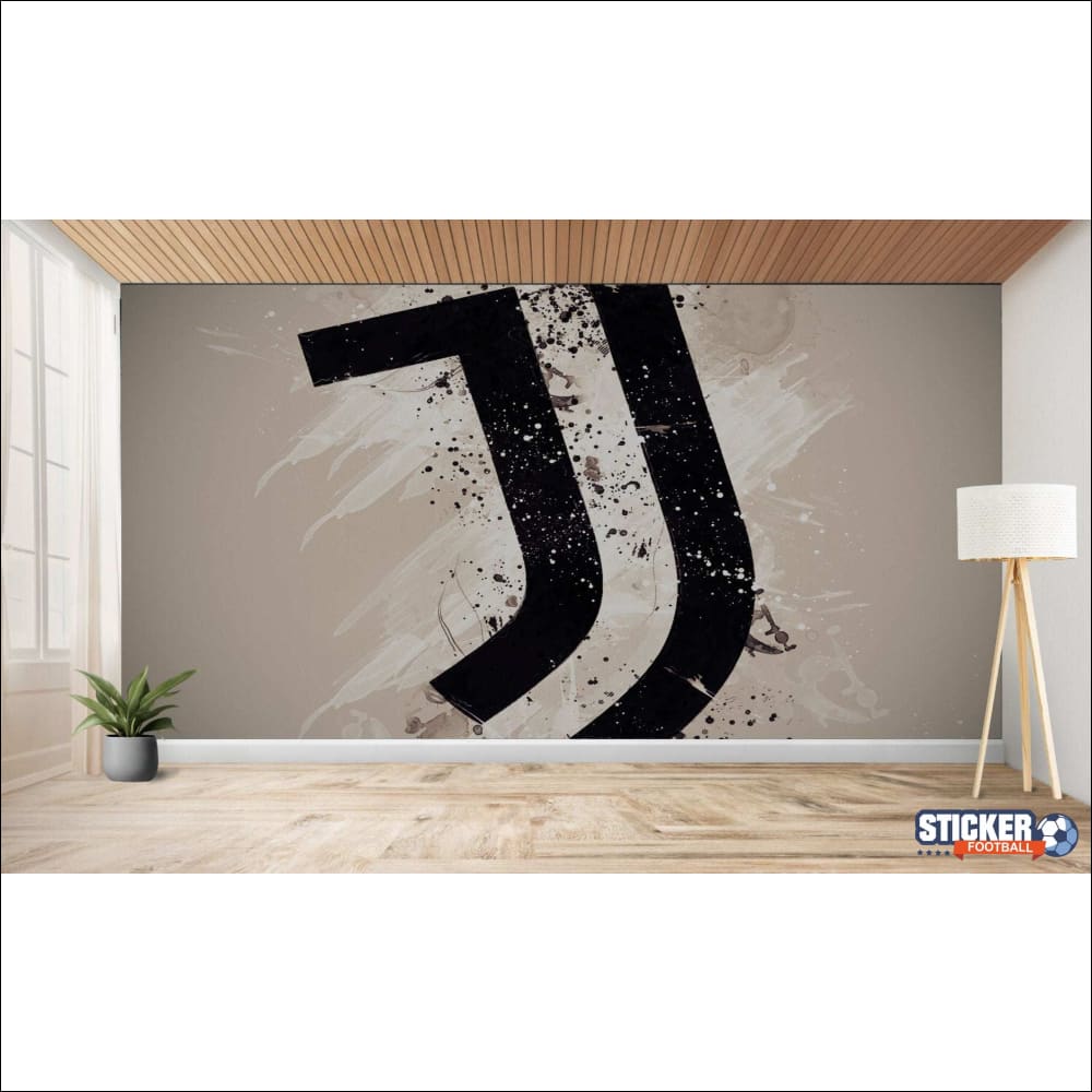 Chambre moderne avec art mural du logo de la Juventus.