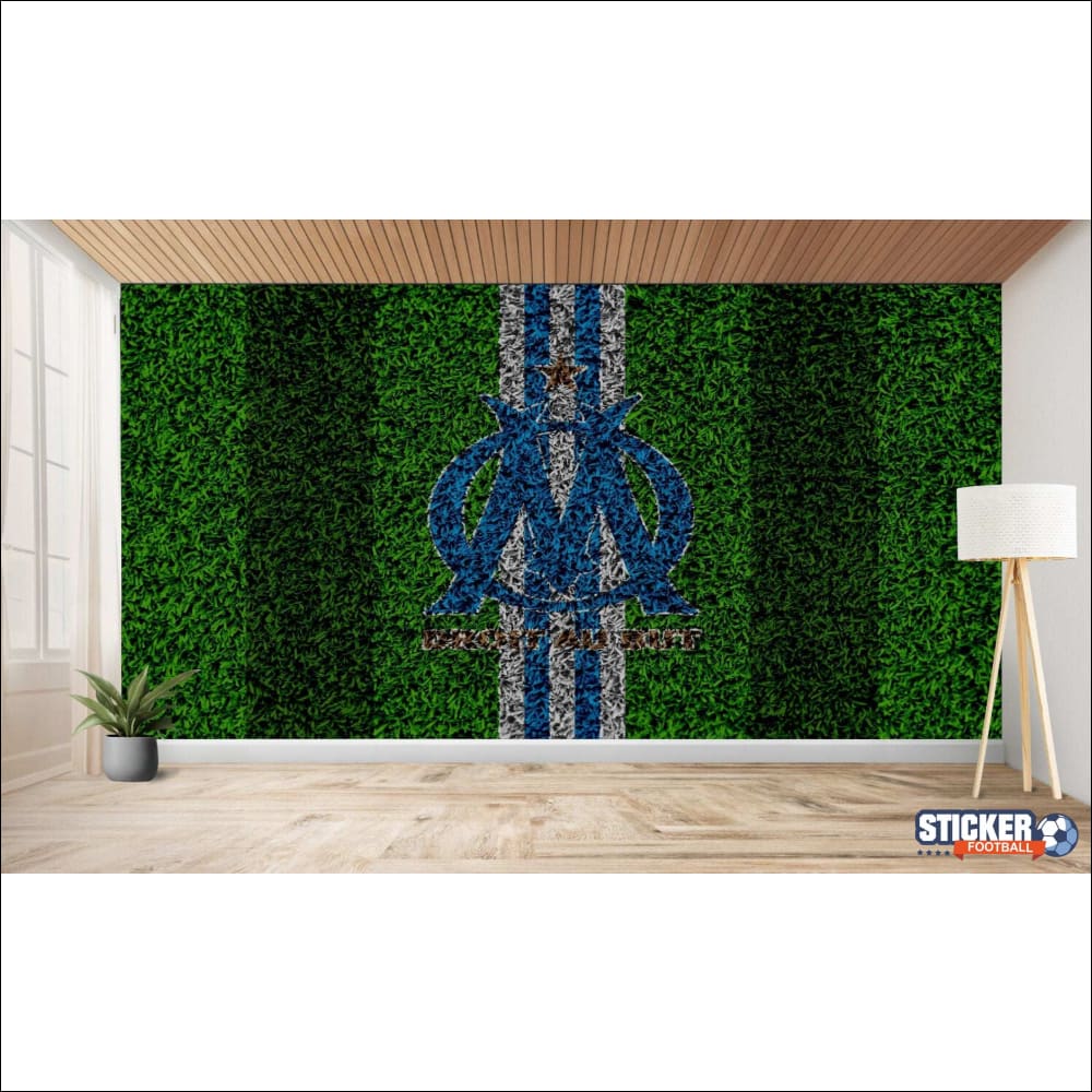 Peinture murale à texture d’herbe avec un logo d’équipe sportive.