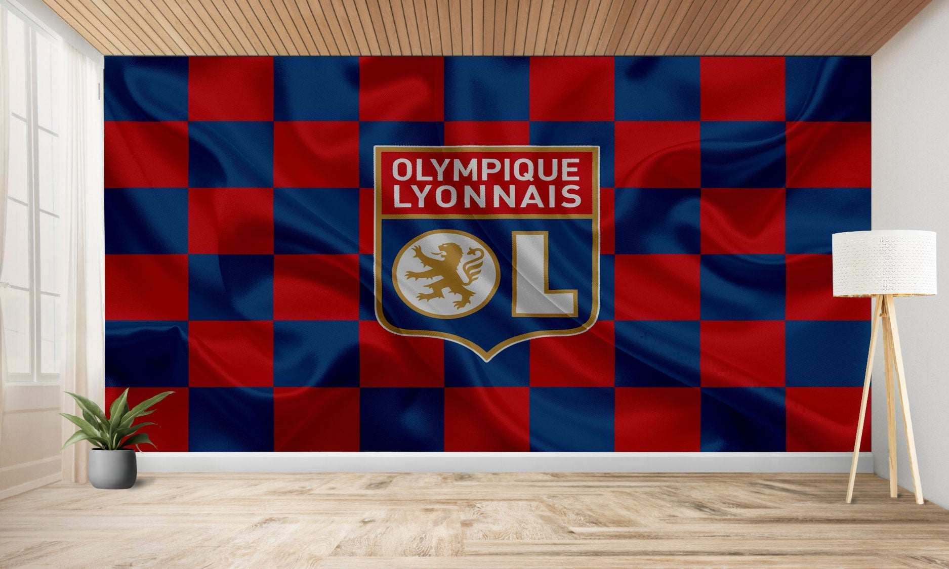 Logo de l’Olympique Lyonnais sur un mur à carreaux.