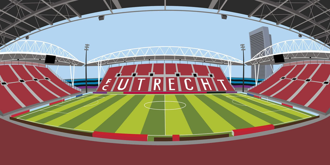 Terrain de football rayé rouge et vert avec l’inscription blanche « uitreicht » sur le poteau de but.
